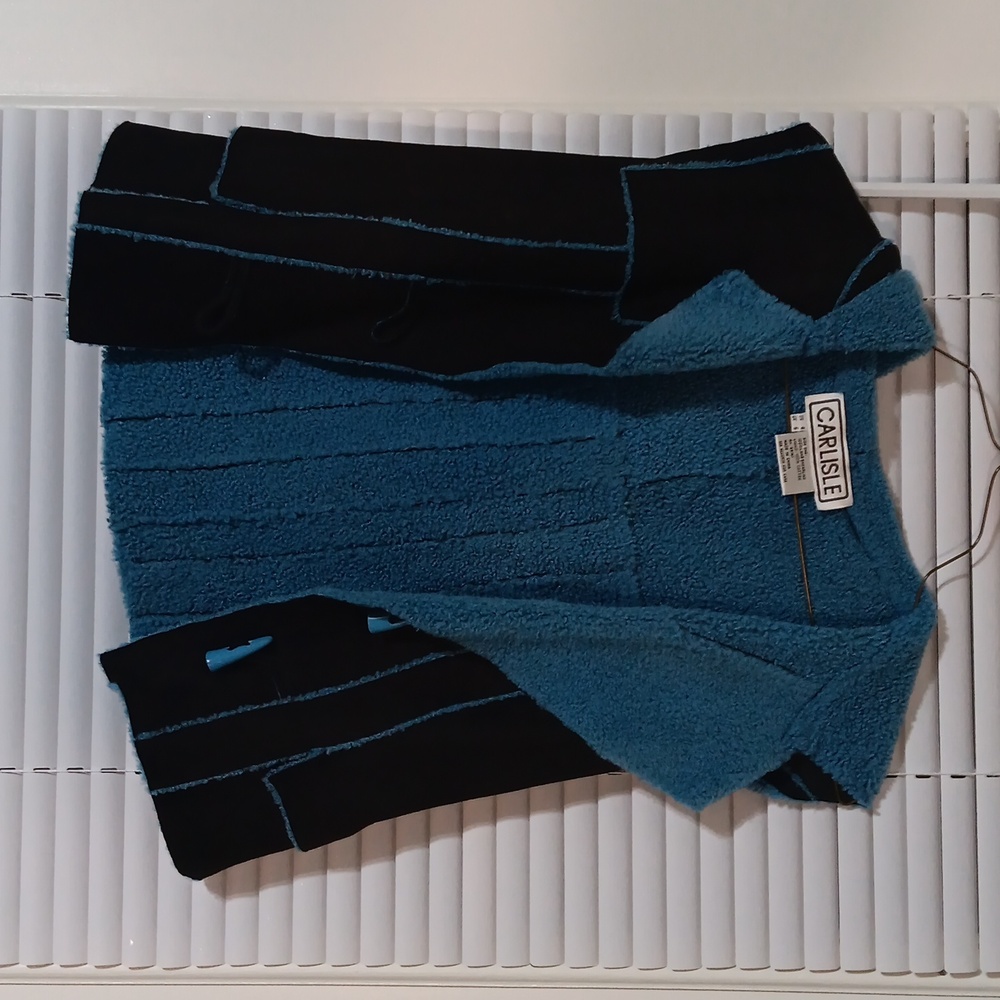 Carlisle size 6US lamb shearling and cotton lined hooded vest.